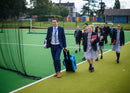 Teacher and students with Sphero BOLT Power Pack walking outside together.