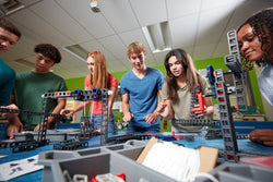 Students build with Blueprint Engineering Kits in their high school classroom.