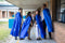 Teachers wearing blue Sphero Super Hero capes. 