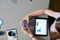 A student programs a BOLT+ robot in the Sphero Edu App on a tablet.