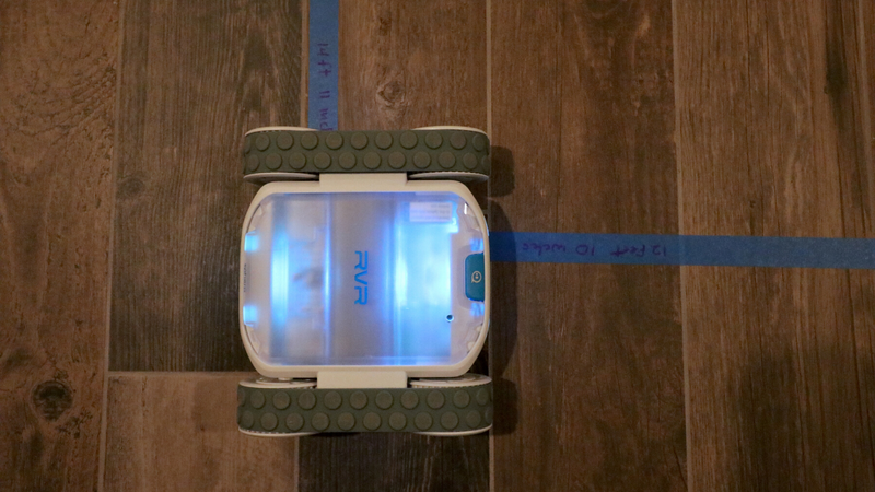 Sphero RVR navigating a tape maze on the floor of a house.