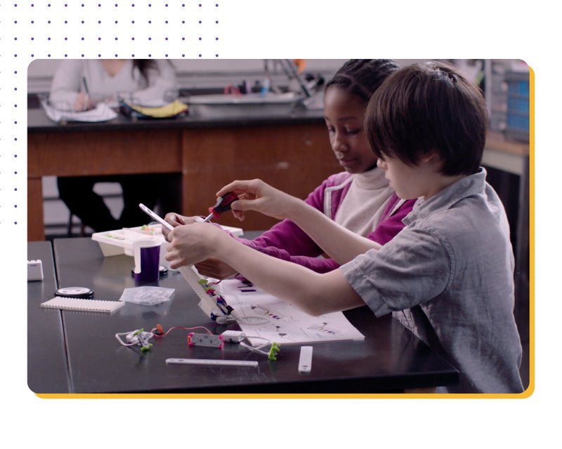 Two students working together to create littleBits STEAM Student Set invention.