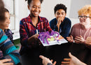 Group of teenagers playing a littleBits hot potato game.