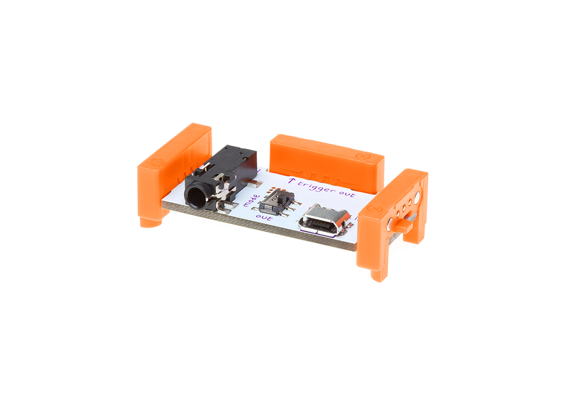 Orange littleBits w5 MIDI bit side view.