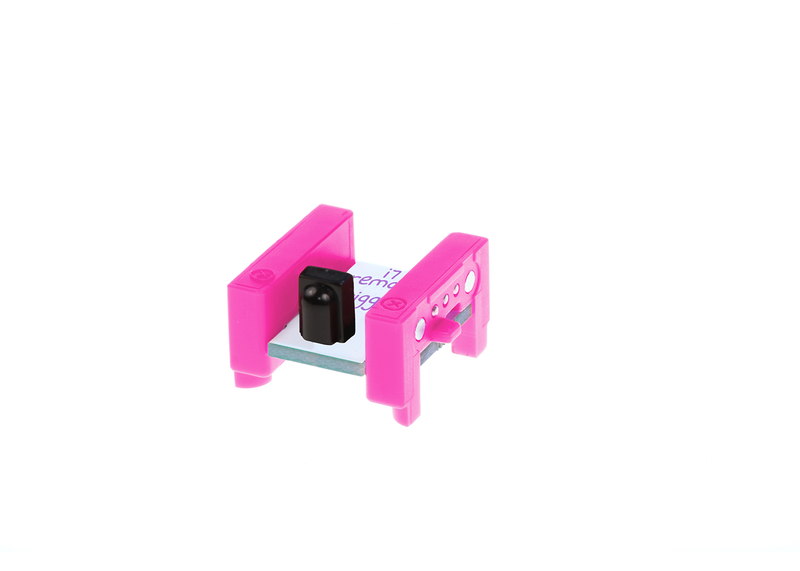 Pink littleBits i7 remote trigger bit side view.
