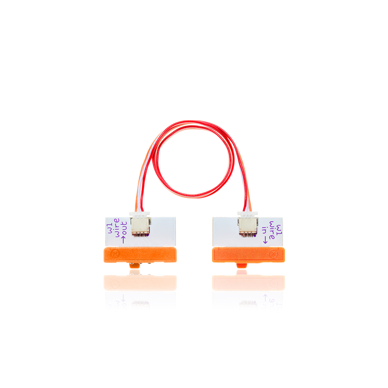 Orange littleBits w1 wire bit.