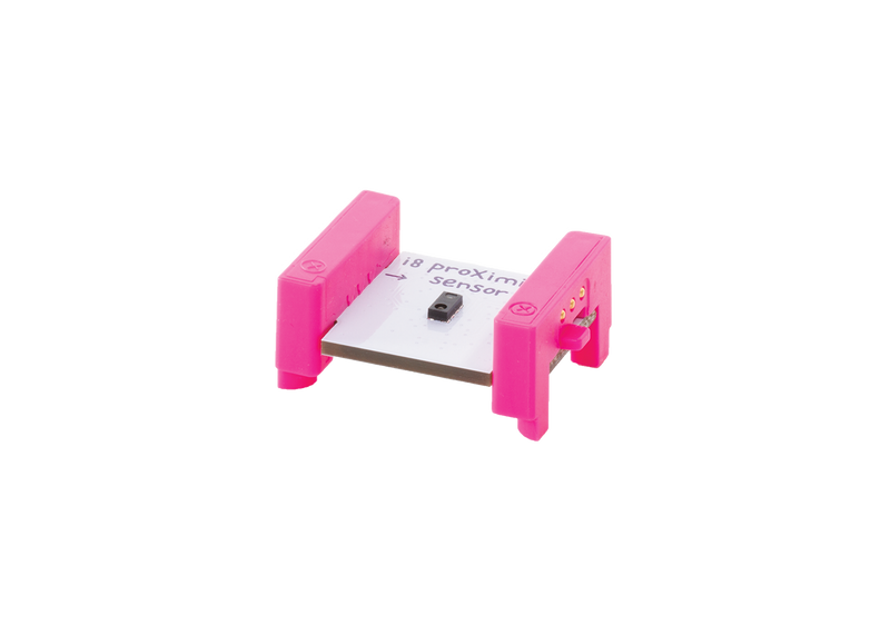 Pink littleBits i8 proximity sensor bit side view.